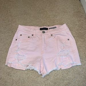 Light pink high waisted Aeropostale cutoff jean shorts.
